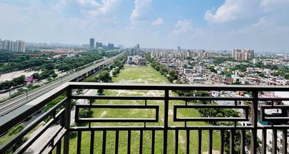 PrimeStays Studio | Couples, Work & Travel Ready near expo mart greater noida