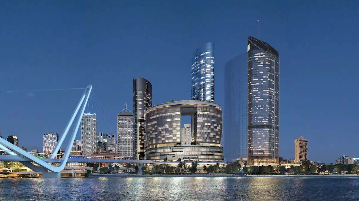 A city skyline with modern high-rise buildings, a bridge, and a body of water.