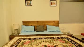 Deluxe Double Room, City View | Desk, laptop workspace, iron/ironing board, free WiFi