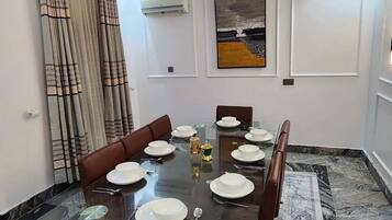 Economy Apartment, Balcony, City View | Dining