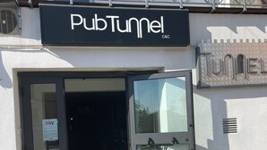 A storefront with a sign reading 'PubTunnel C&C.' - Charming town house located in the beautiful historic village of Casalanguida. (Casalanguida)