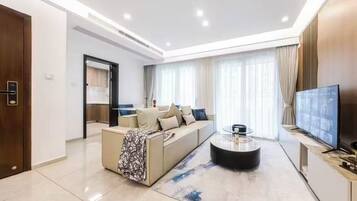 Family Suite, 3 Bedrooms, Balcony, City View | Desk, laptop workspace, blackout drapes, soundproofing
