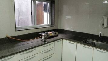 Fridge, microwave, oven, cookware/dishes/utensils