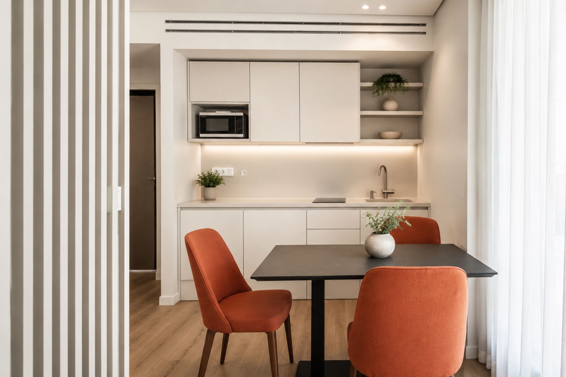 Appartamento Deluxe, balcone, vista città | Pasti