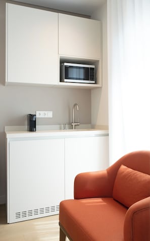 Deluxe Studio Suite, Balcony, City View | Living area - Trilogia Suites (Athina)