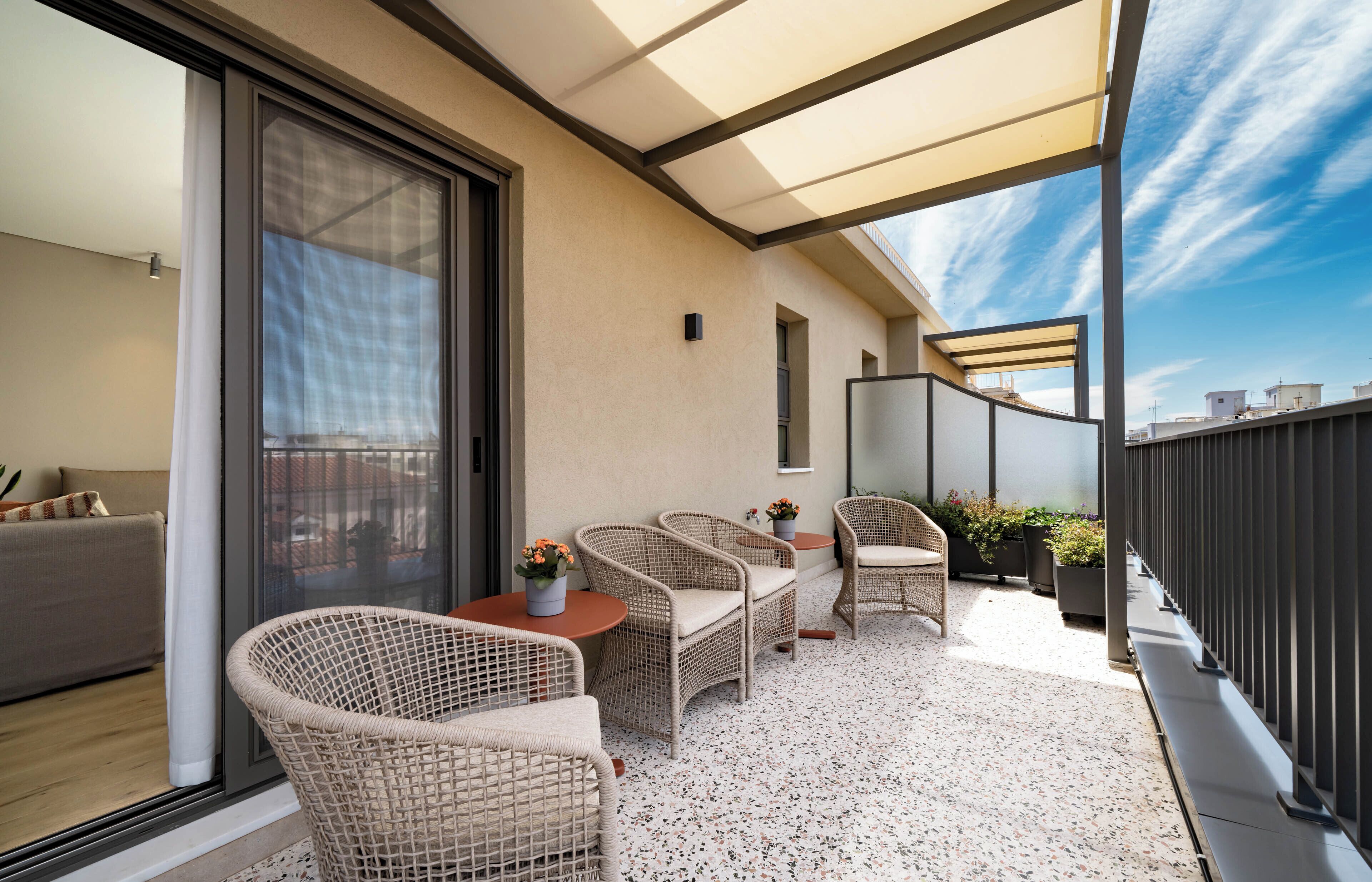 Appartamento Deluxe, balcone, vista città | Terrazza/patio