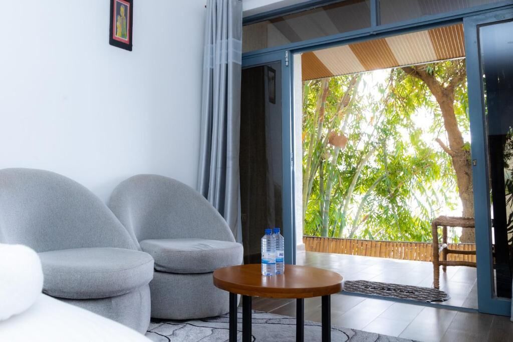 Habitación doble, balcón, vista al jardín | Terraza o patio