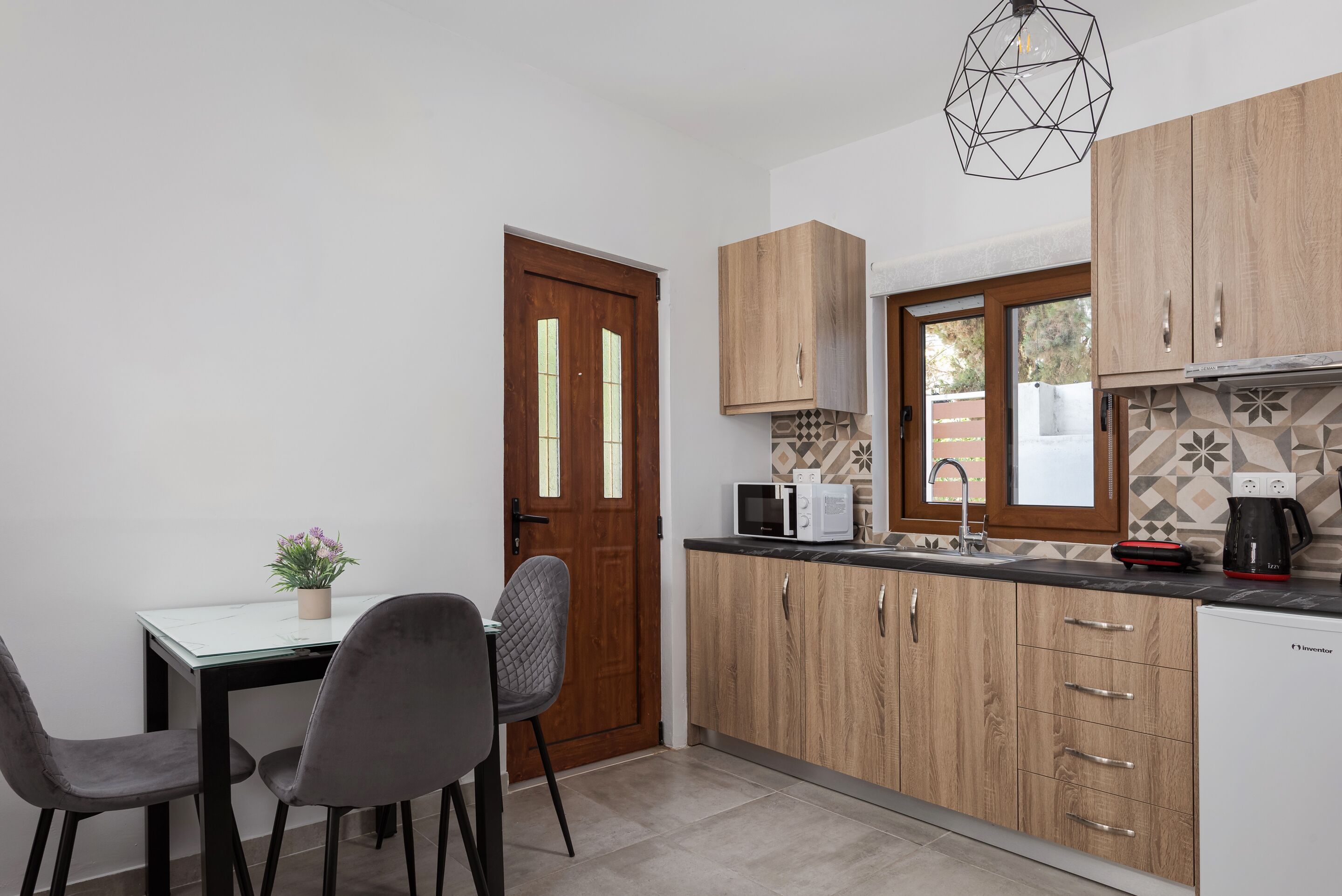 Suite Deluxe | Cocineta privada | Frigobar, microondas, parrilla de estufa y cafetera y tetera 