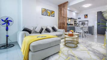 Deluxe-Apartment, Stadtblick | Wohnbereich