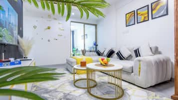 Apartamento luxo, vista para a cidade | Área de estar