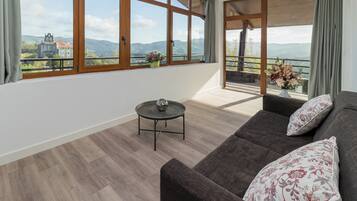 Basic Suite, Mountain View | Living area | 32-inch LED TV with digital channels