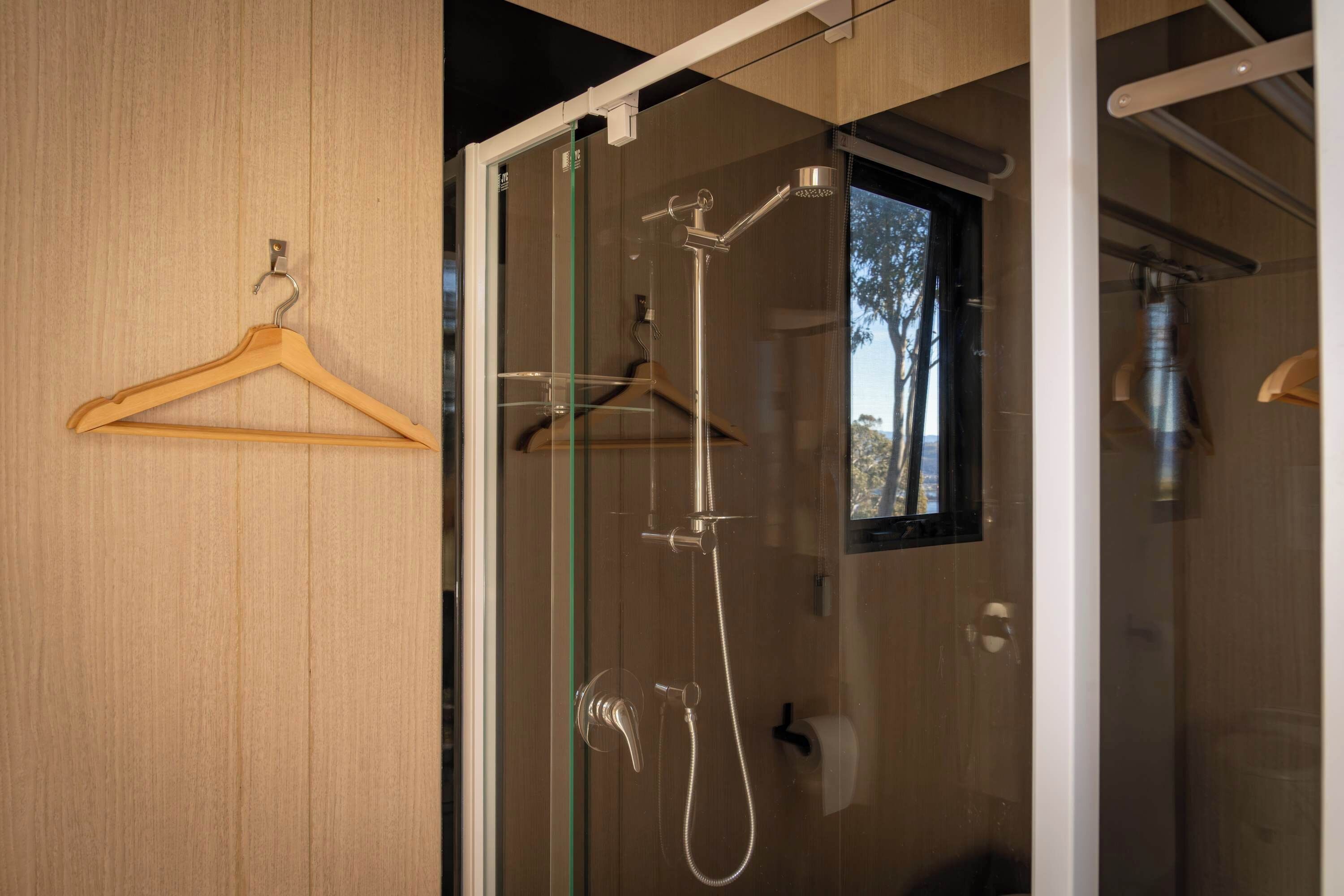 Shower, hair dryer, towels, shampoo