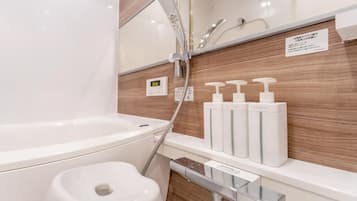 Hair dryer, bidet, towels, soap
