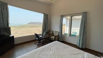 Premium Cottage, Balcony | In-room safe, desk, laptop workspace, free WiFi