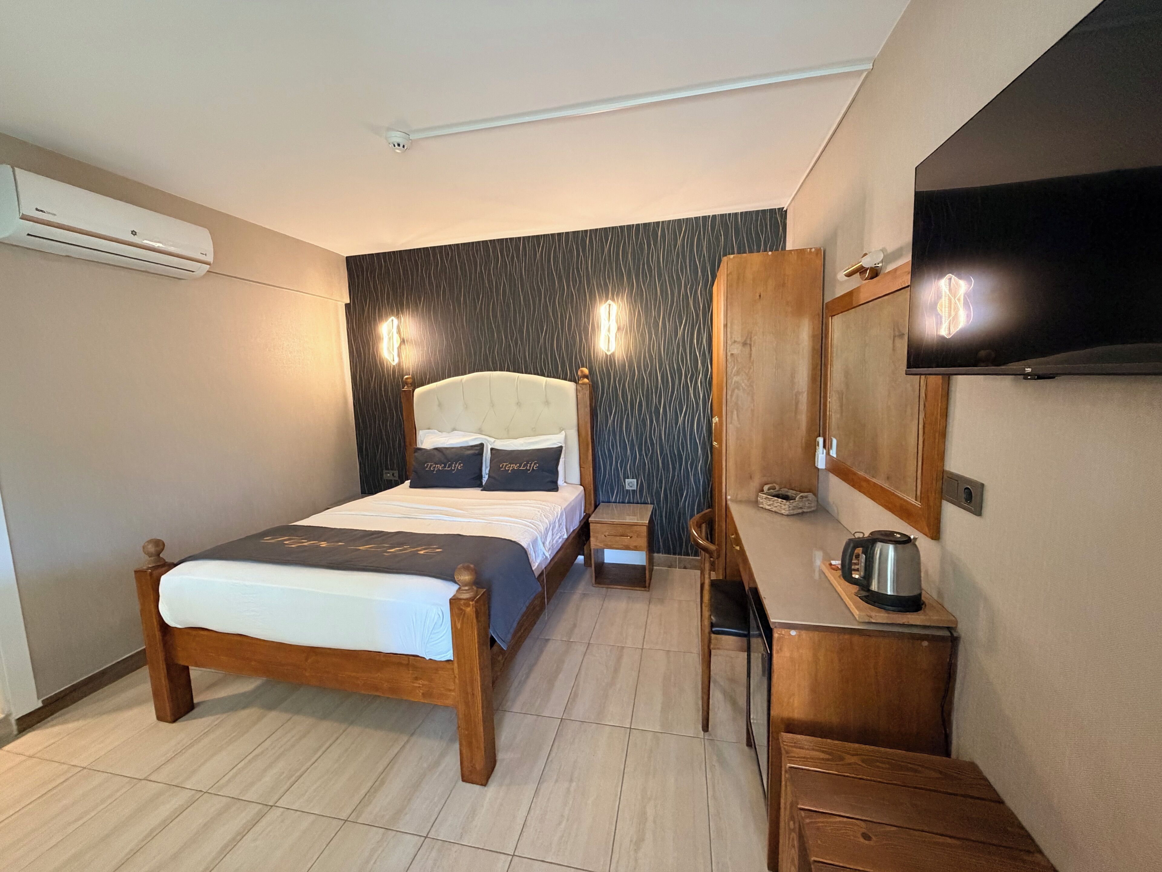 Deluxe Room, Garden View | In-room safe, laptop workspace, free WiFi