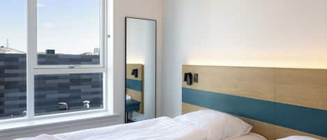 Blackout drapes, soundproofing, iron/ironing board, free WiFi