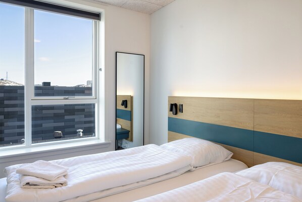 Blackout drapes, soundproofing, iron/ironing board, free WiFi