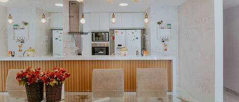 Fridge, microwave, oven, cookware/dishes/utensils