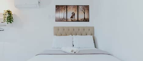 Tabla de planchar con plancha, Internet, ropa de cama