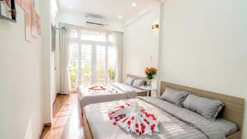Family Suite, Balcony, City View | Minibar, iron/ironing board (on request), WiFi (free)