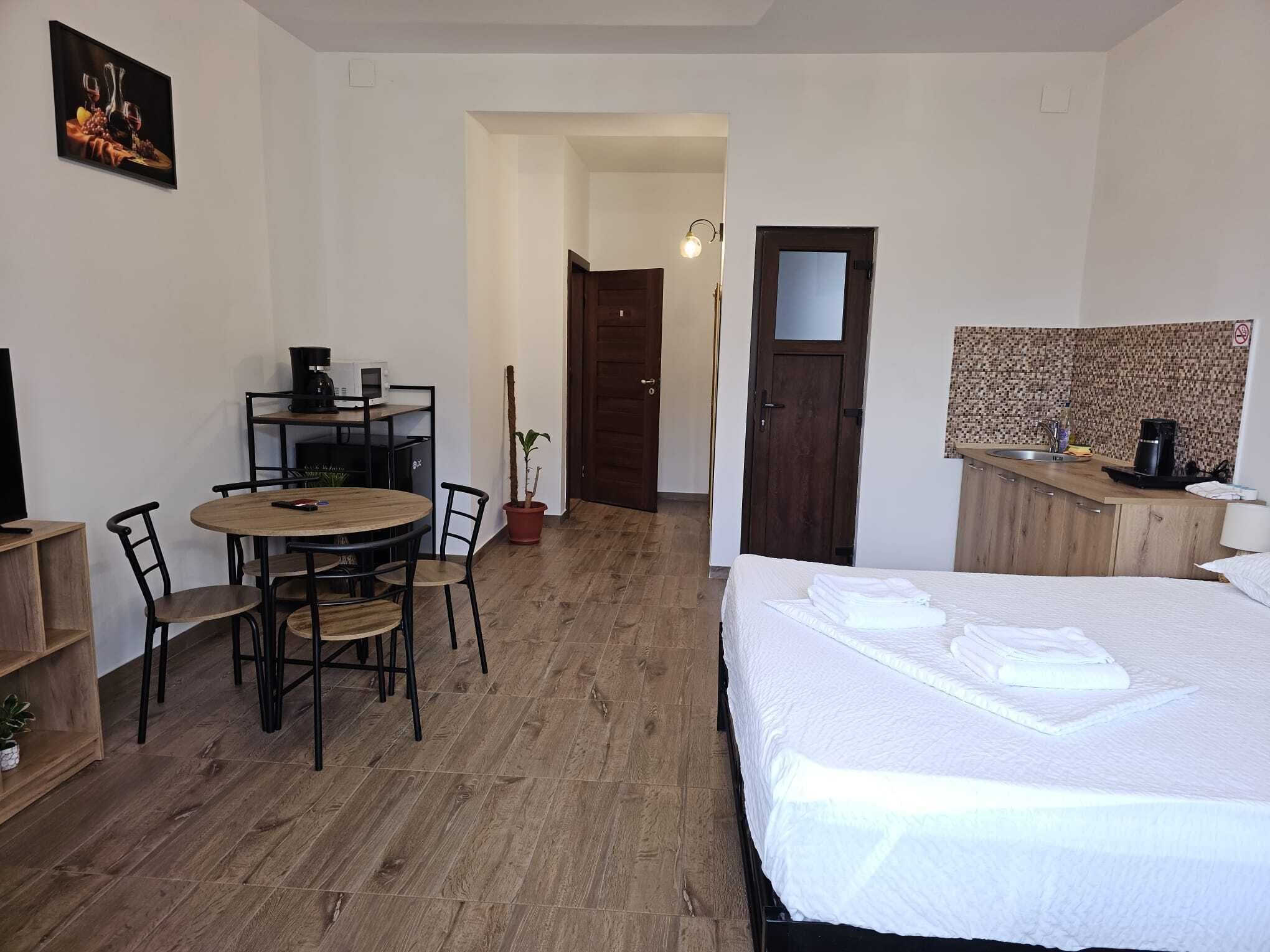 Studio, City View | Living area | Flat-screen TV