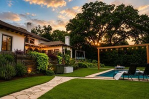 A house with a swimming pool, a stone pathway, and a pergola with string lights. - Grand Luxury 11,000 sq ft Estate — 6BR, 8BA, Pool & Premium Finishes (Dallas)