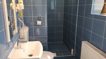 Studio, Patio | Bathroom | Shower, soap, toilet paper