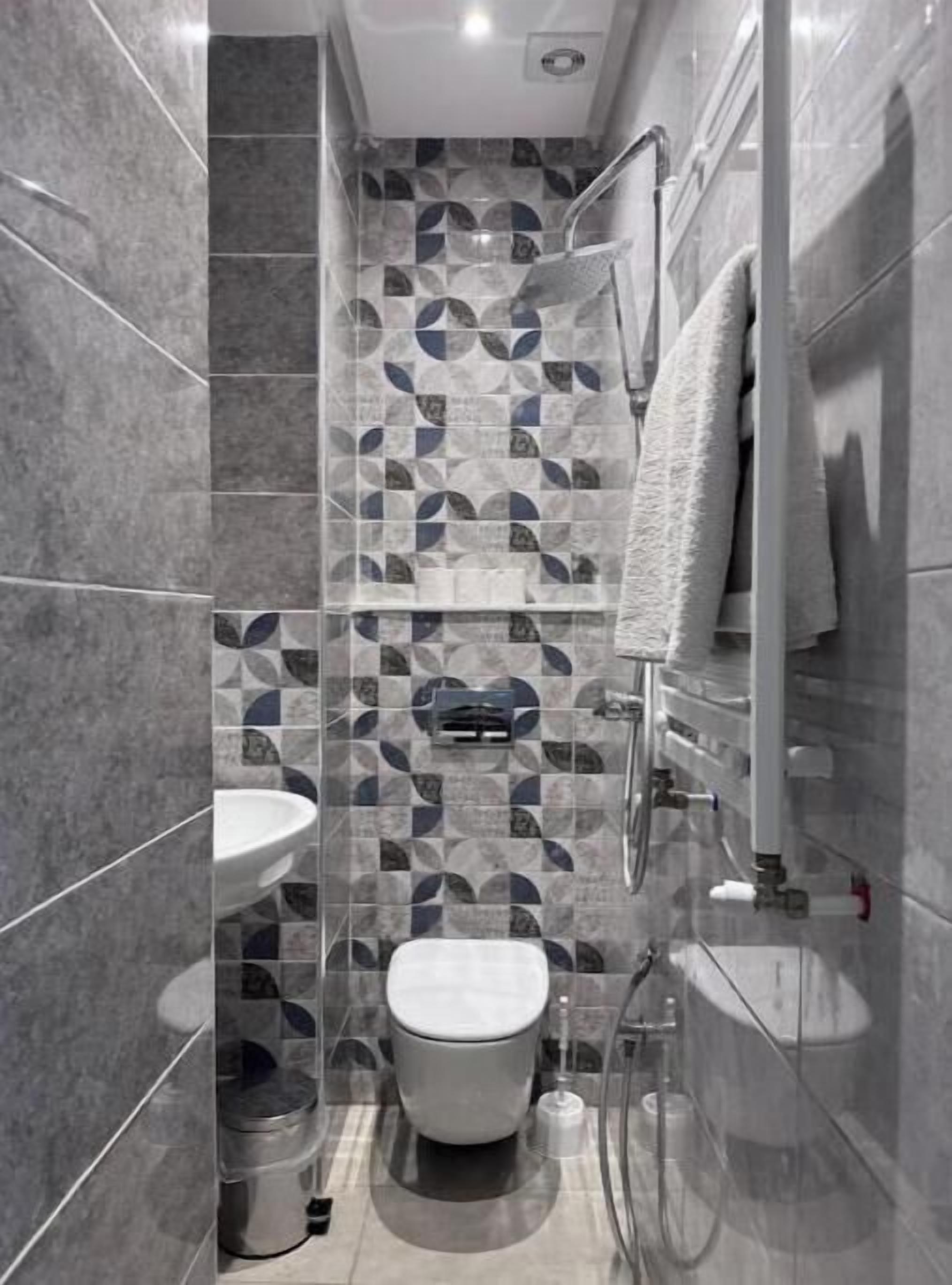 Shower, towels, soap, toilet paper