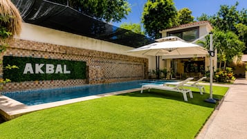Outdoor pool, open 7:00 AM to 11:30 PM, pool umbrellas