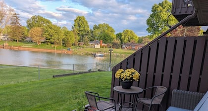 waterfront 2-bedroom condo with private deck overlooking Clinton River