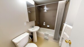 A bathroom with a toilet, sink, bathtub, and shower. - 1 Bedroom Apt available Downtown Toronto,15 minutes to CN Tower (Toronto)