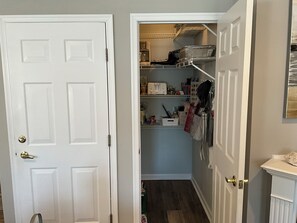 A hallway with a white door, a closet with shelves, and a white radiator. - Spacious 3 Bedroom 2 Full baths in Wildwood Crest. 3 Blocks from to the beach. (Wildwood)