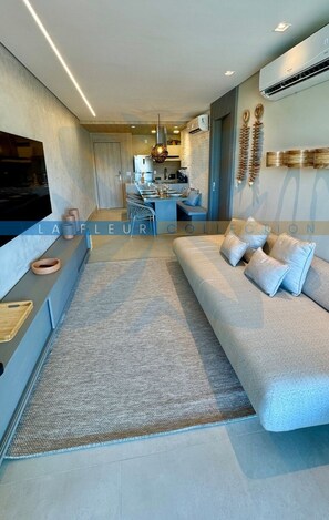 Luxury Apartment | Living area | 49-inch Smart TV with digital channels