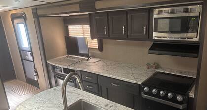 Cozy 1-bedroom Camper on the lake with AC in adorable Cortland.