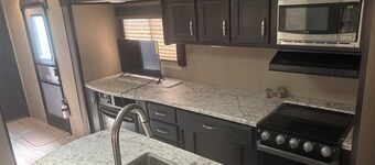Cozy 1-bedroom Camper on the lake with AC in adorable Cortland.