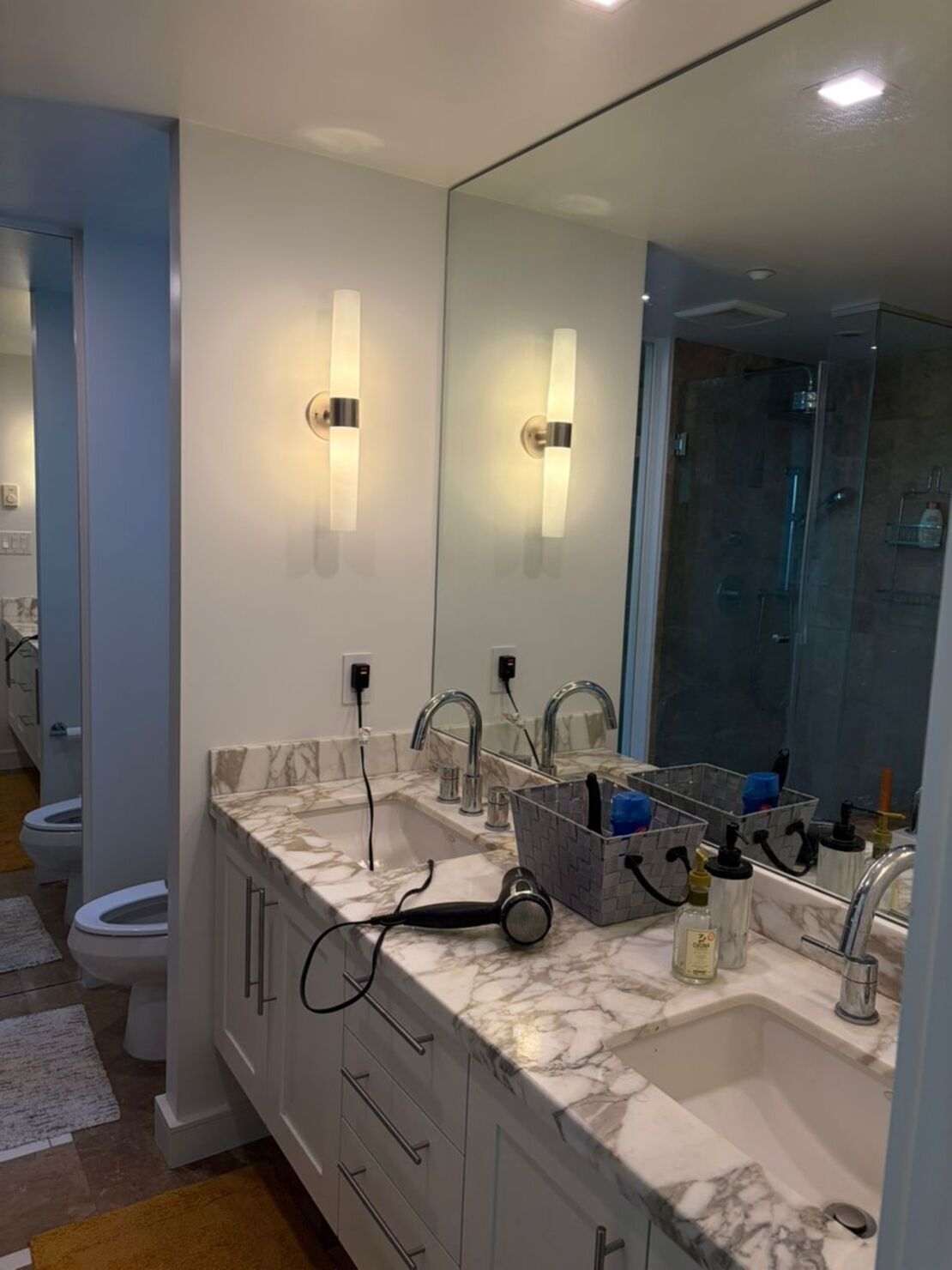 Separate tub and shower, hair dryer, slippers, towels