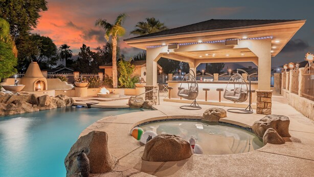 A pool area with a hot tub, lounge chairs, and a covered seating area. - YNotStay_GilbertAZ - Spacious Gilbert Getaway Private Pool Home Retreat (Gilbert)