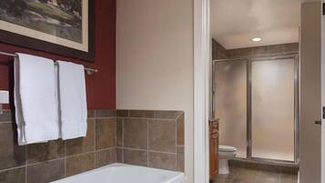 Jetted tub, hair dryer, towels, soap