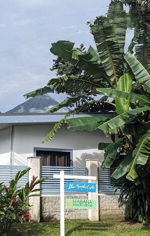 A building with a sign reading 'Blue Morpho Casa' and 'Habana River Lodge.' - Blue Morpho Casita Private Pool & Volcano View minutes from downtown La Fortuna  (La Fortuna)