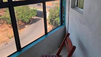 Triple Room, Balcony, City View | Interior