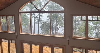 Tranquil Evergreen Landing on Six Mile Lake