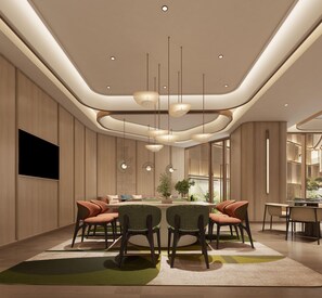 Uma sala de jantar moderna com uma mesa redonda, cadeiras, iluminação pendente e vista para o exterior.