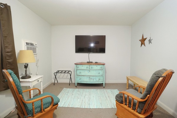 Standard Double Room, Non Smoking | Living area | 50-inch Smart TV with cable channels