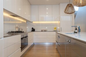Oven, stovetop, cookware/dishes/utensils, dining tables - Margaret House | Elegant City-Fringe Escape (North Adelaide)