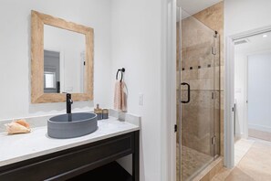 Shower, hair dryer, towels, toilet paper - Waterfront Bliss in Paradise | Cozy Condo Near Beaches, Dining & More (The Bight Settlement)