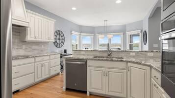 Coffee/tea maker, fridge, microwave, oven