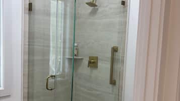 Shower, towels, soap, toilet paper