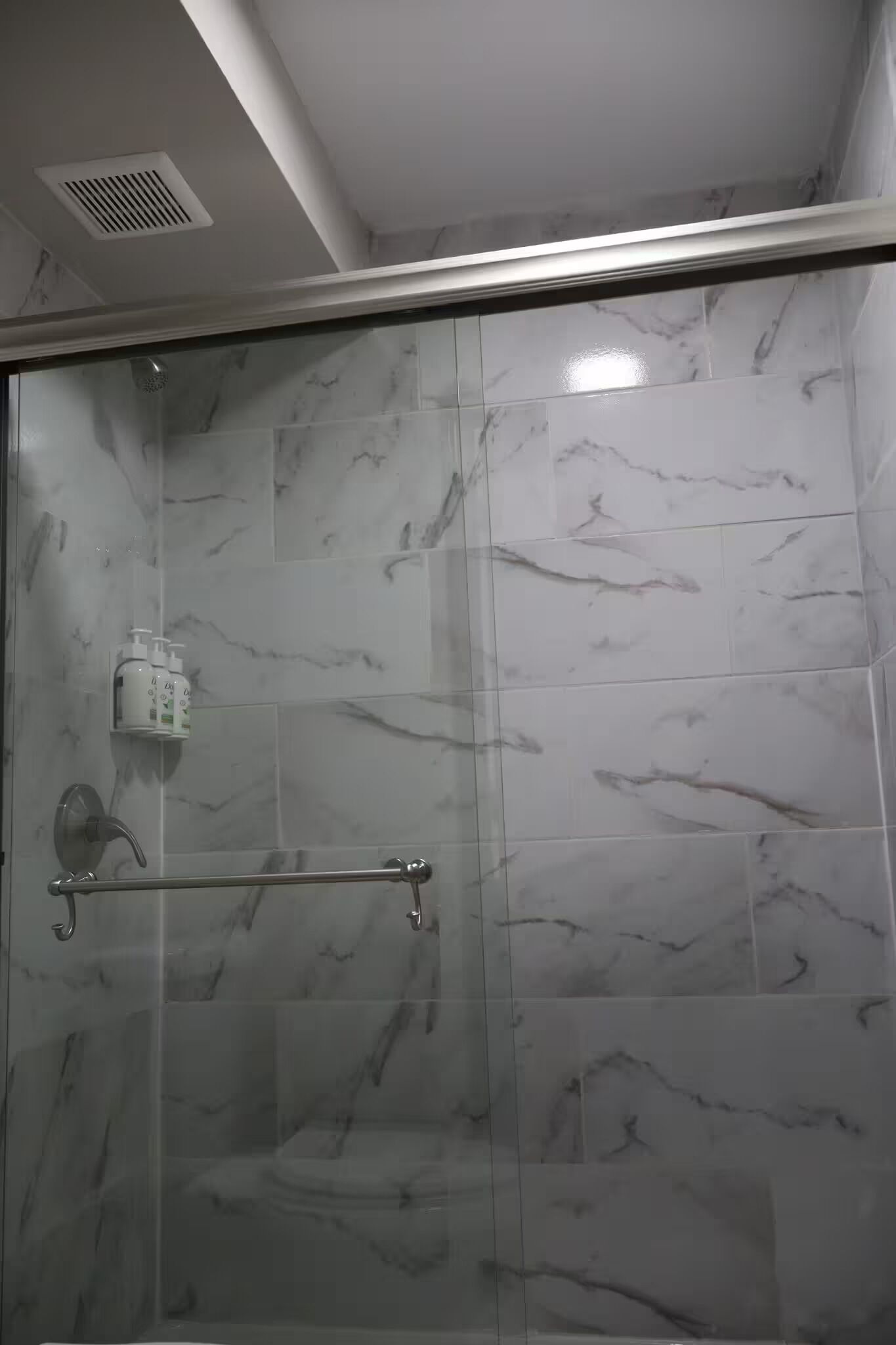 Shower, towels, soap, shampoo