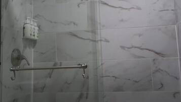 Shower, towels, soap, shampoo