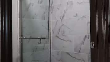 Shower, towels, soap, shampoo